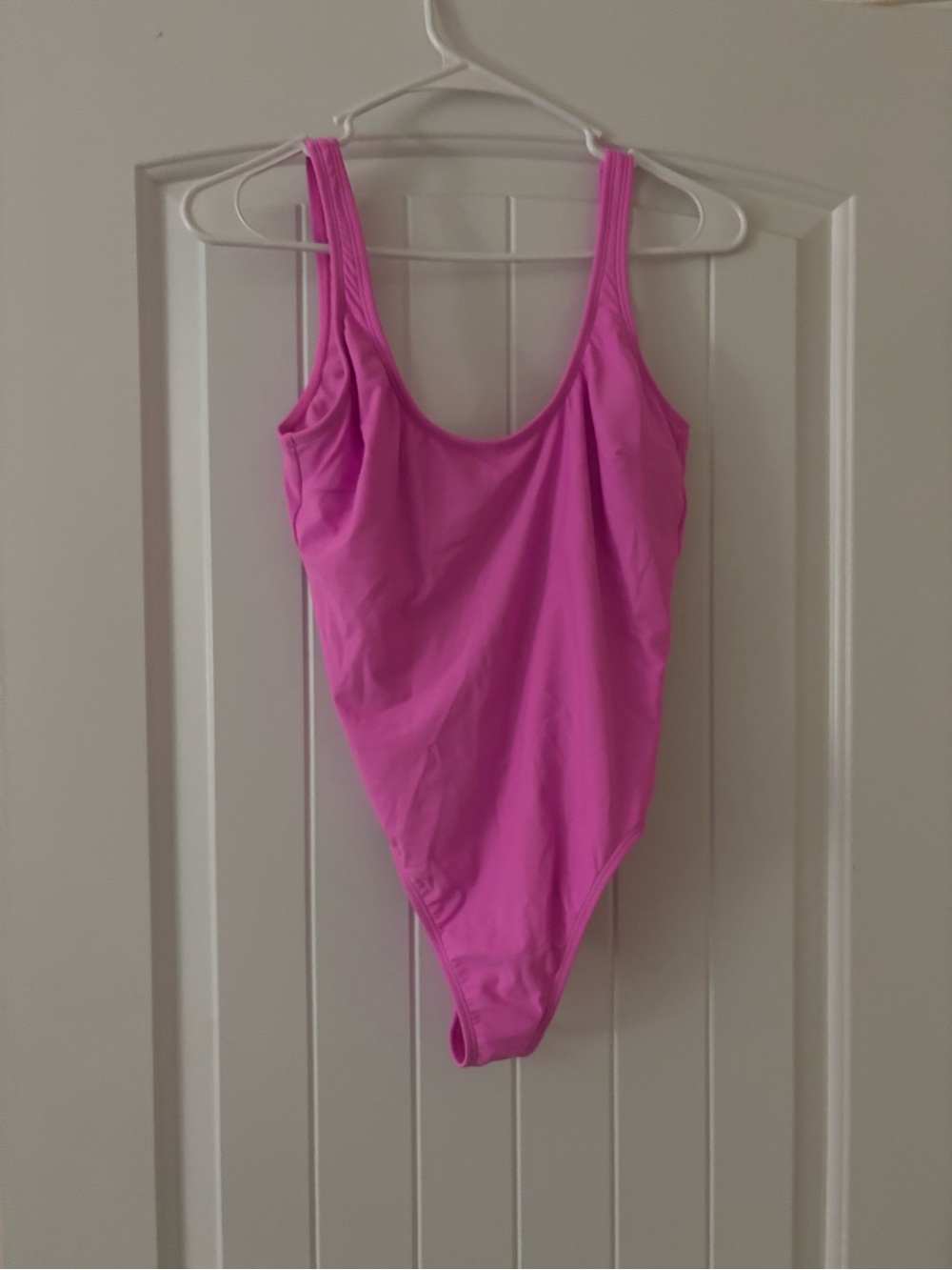 One piece bathing suit. Size medium. Never worn.